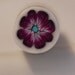 Purple and Turquois flower cane - Polymer clay cane unbaked and ready to use. Translucent background of Kato and Fimo clays.