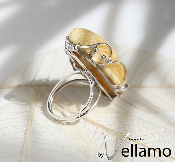 Modern sterling silver adjustable ring with large OOAK white - yellow natural Baltic amber, OOAK ring