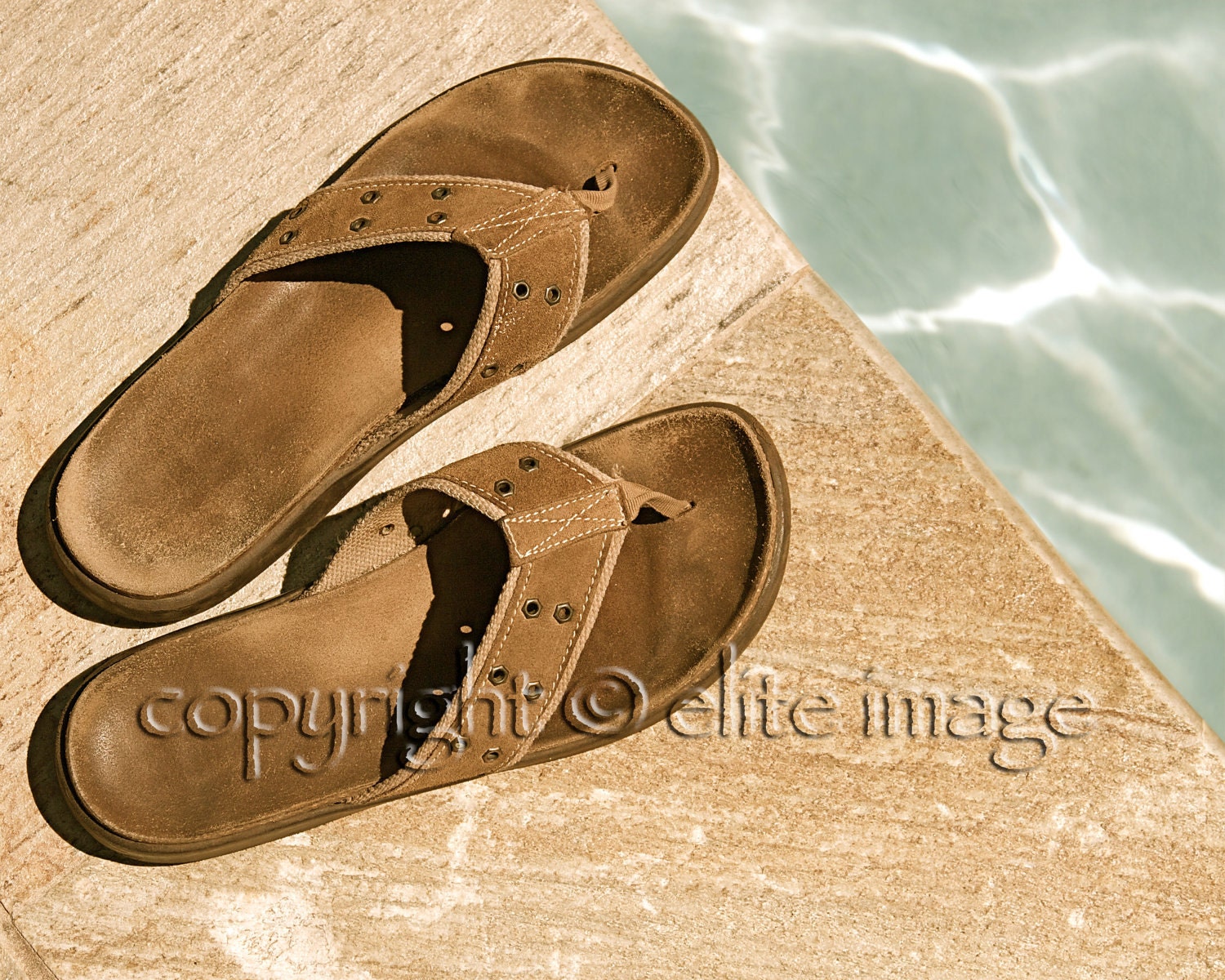 Leather Sandals on the Deck of a Swimming Pool - 8x10