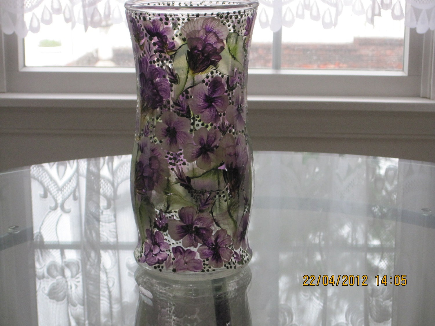 Vase with purple flowers