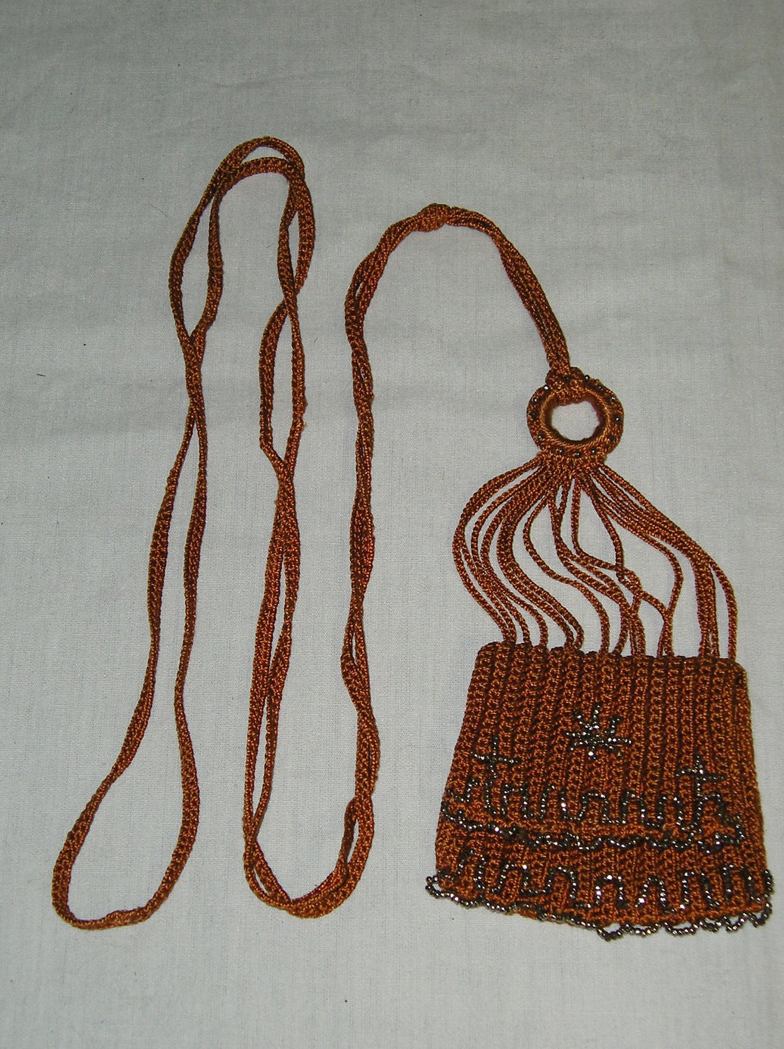 Crochet purse with silver metal beads