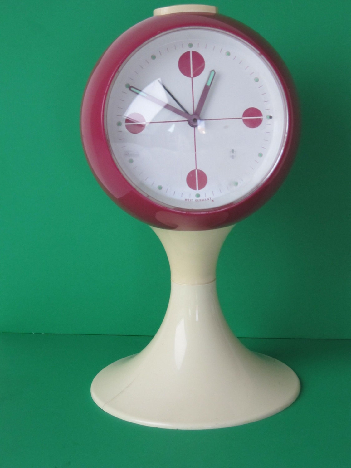 Pedestal retro alarm clock from the seventies vintage