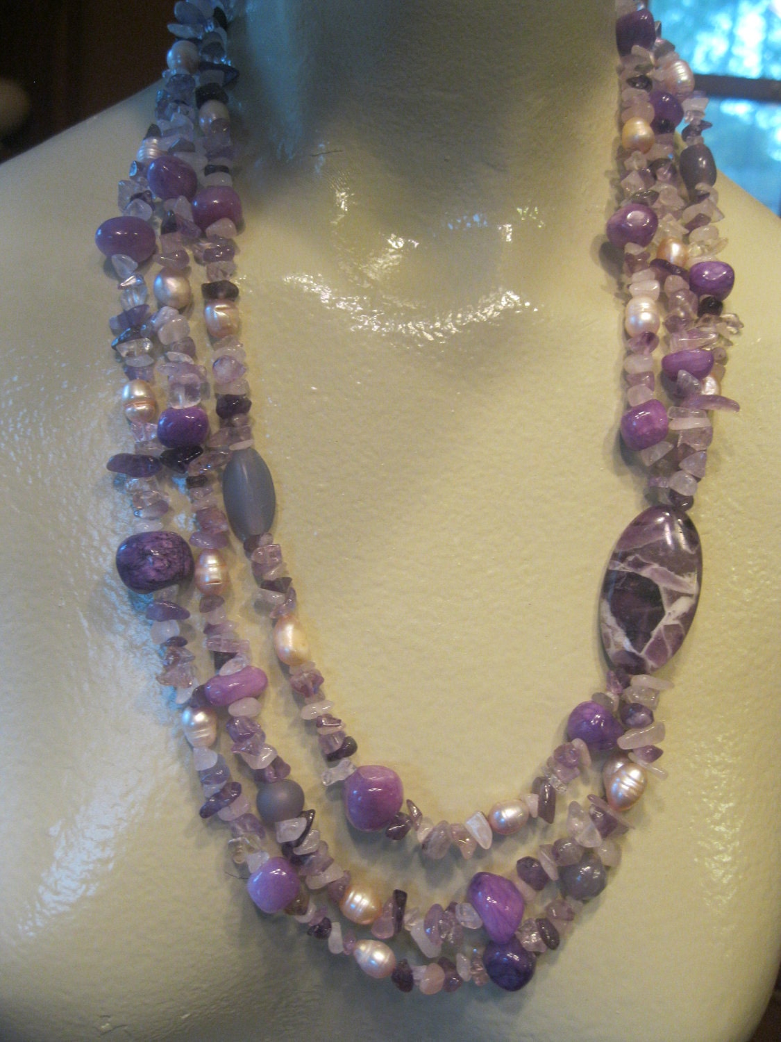 Chunky Multiple Strand Purple Necklace with Offset Stone and Matching Earrings