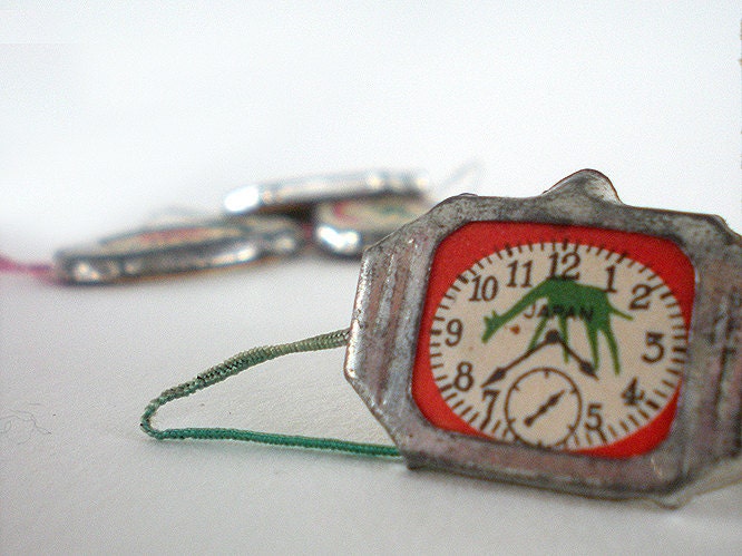 Tin and paper novelty watch, made in Japan