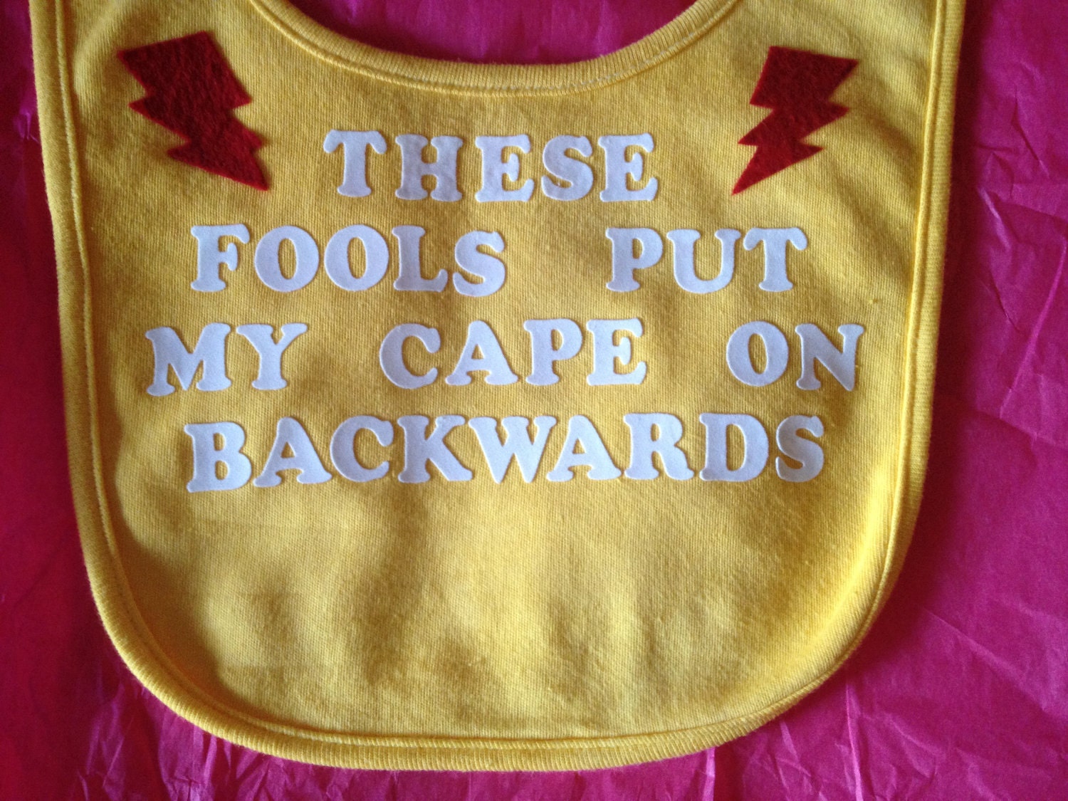 Unique Baby Bib With Cute Decal-"These Fools Put My Cape On Backwards"