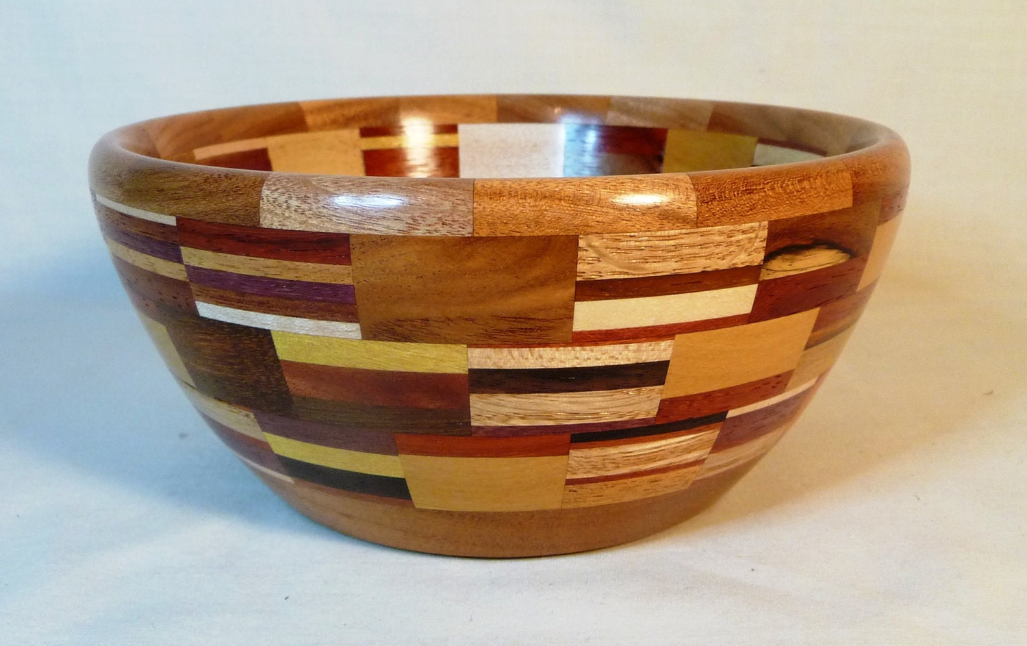 Segmented bowl with more than 30 domestic and exotic hardwoods. - HWRWood
