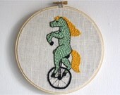 horse riding a unicycle - hand embroidery hoop