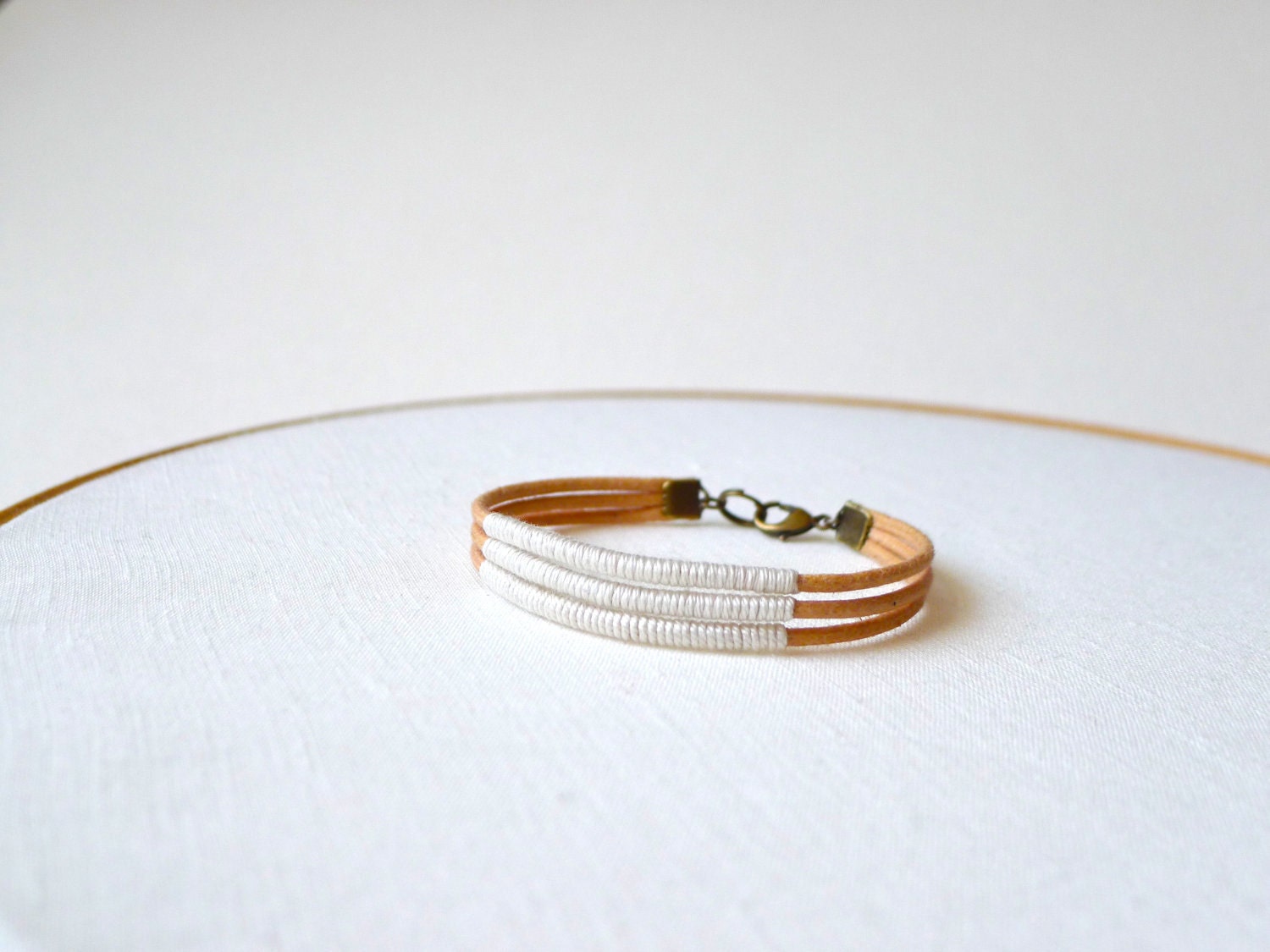 Multi strand cuff - light peach cotton thread wrapped