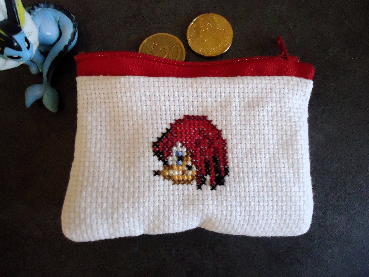 Knuckles cross stitched purse