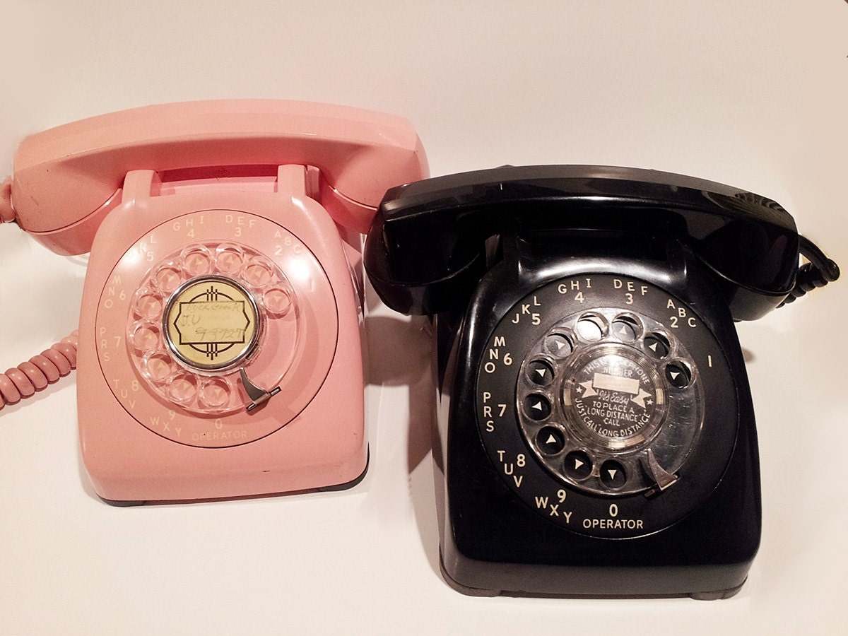 Pink and Black His-and-Hers Rotary Phones