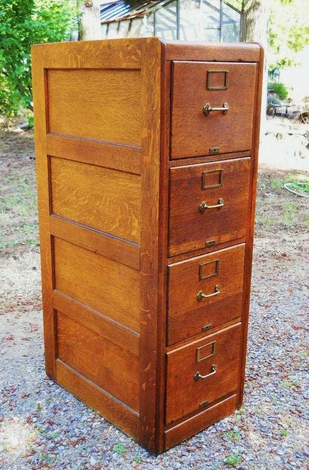 Circa 1890s to 1900 Victorian Antique Arts and Crafts Industrial Solid Quartersawn Mission Oak Filing Cabinet 4 drawers Paneled sides & back