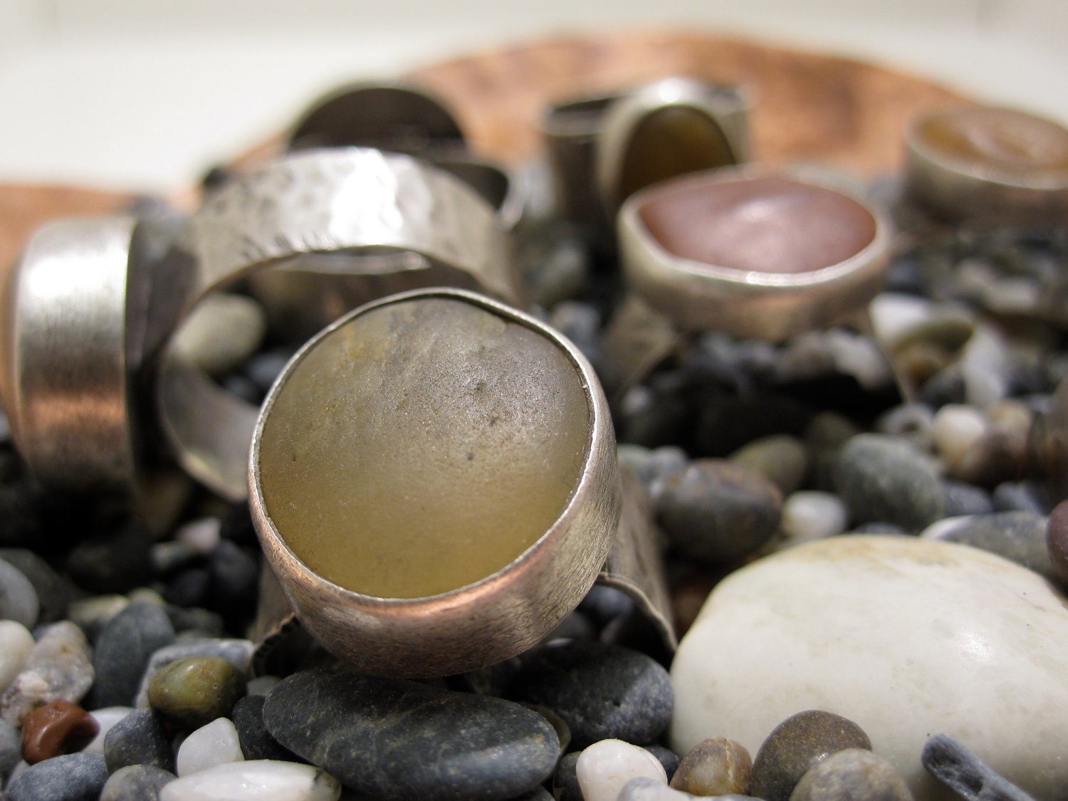 River stone rings with forged silver bands
