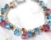 Blue and Pink Crystal  Bracelet. Swarovski Crystal Cube and Sterling Silver Blue,Pink and Orange Hand Wire Wrapped Charm Bracelet
