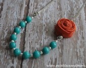 Elisa. Turquoise beaded necklace with orange rosette, or choose your color rosette