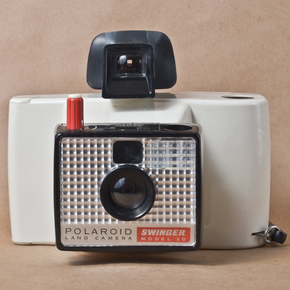 The Swinger 1960s Polaroid Camera for Display and Not the Naughty Couple Down the Street FOR DISPLAY ONLY