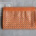 JONNE nothing but holes clutch in cognac leather