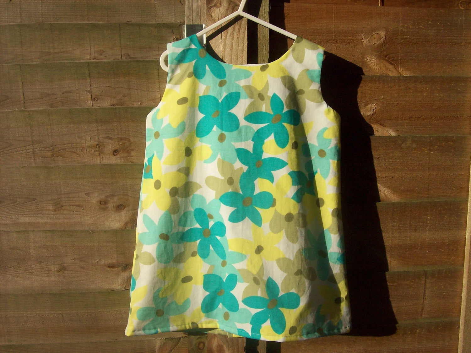 Girls turquoise yellow floral pinafore dress