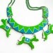 Necklace Carousel Green Horses. circus necklace, funny bright jewelry