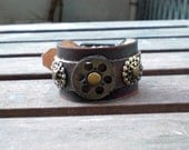 Leather Cuff Bracelet, with steampunk gears, antique Rivets and Buckle Closure