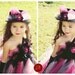 Punk rock Birthday girl. Crocheted top and with black feathers, rosette shown with matching hat.