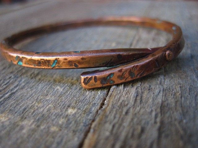 Riveted copper bracelet with marine blue patina