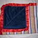 SALE: Retro Striped baby or toddler blanket with red satin trim and navy