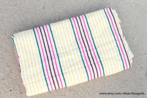 Beach Blanket. Bright colored stripes, thin material