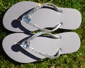 BLing Crystal Flip Flops With Giant Rhinestone Center