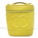 Vintage CHANEL caviarskin cosmetic and toiletary yellow purse. Very chic.