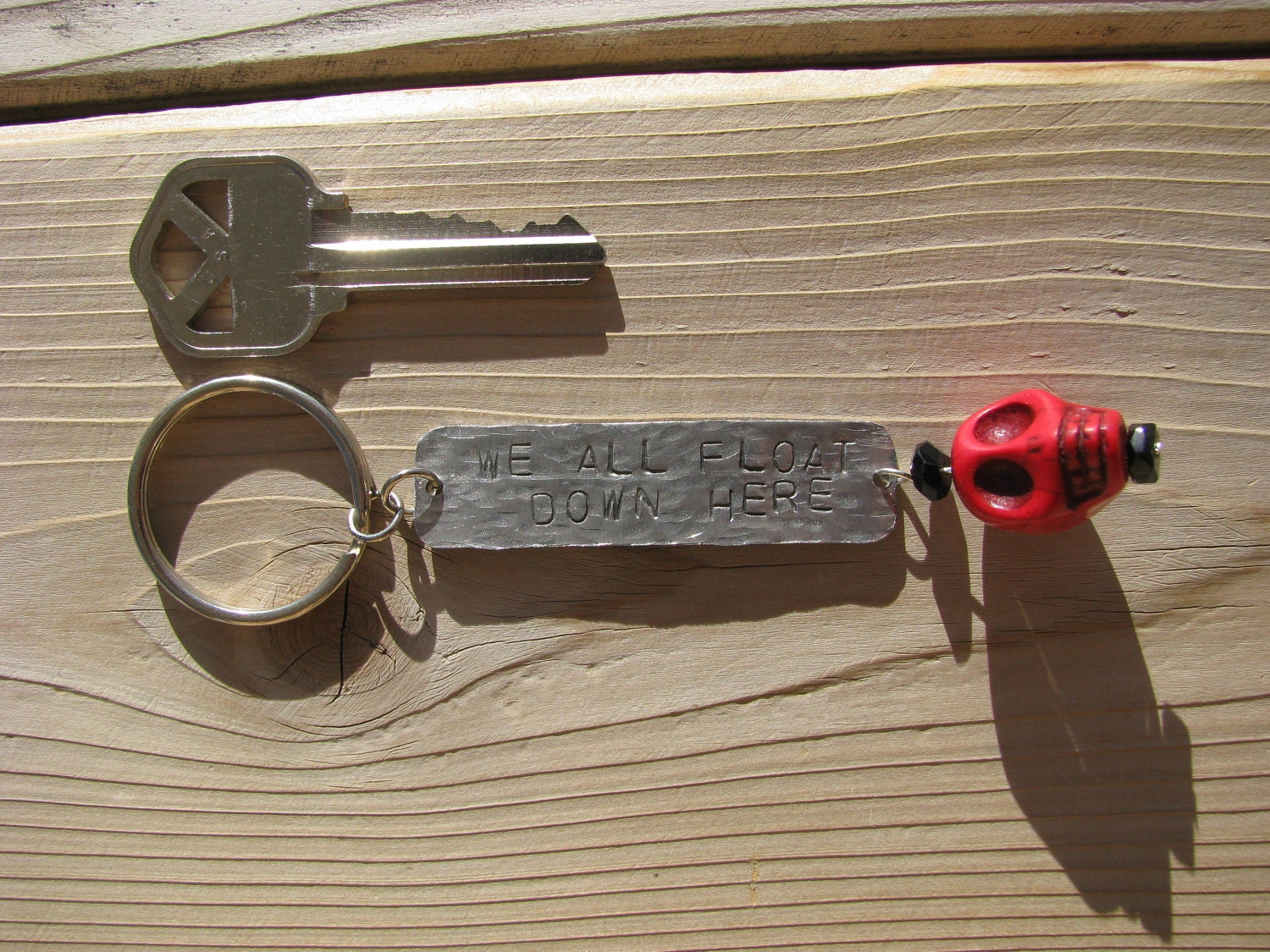 We All Float Down Here Keychain