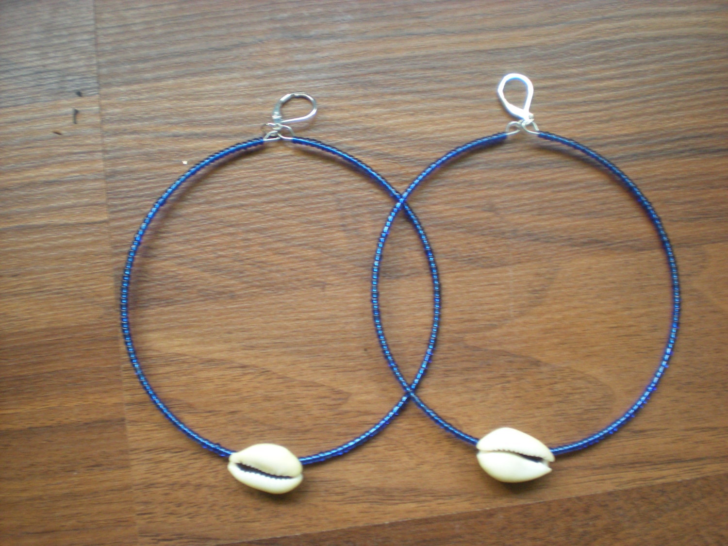 Blue Large Hoops with cowry/cowrie shell.