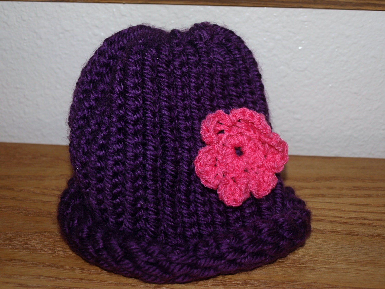 crochet hat with medium flower
