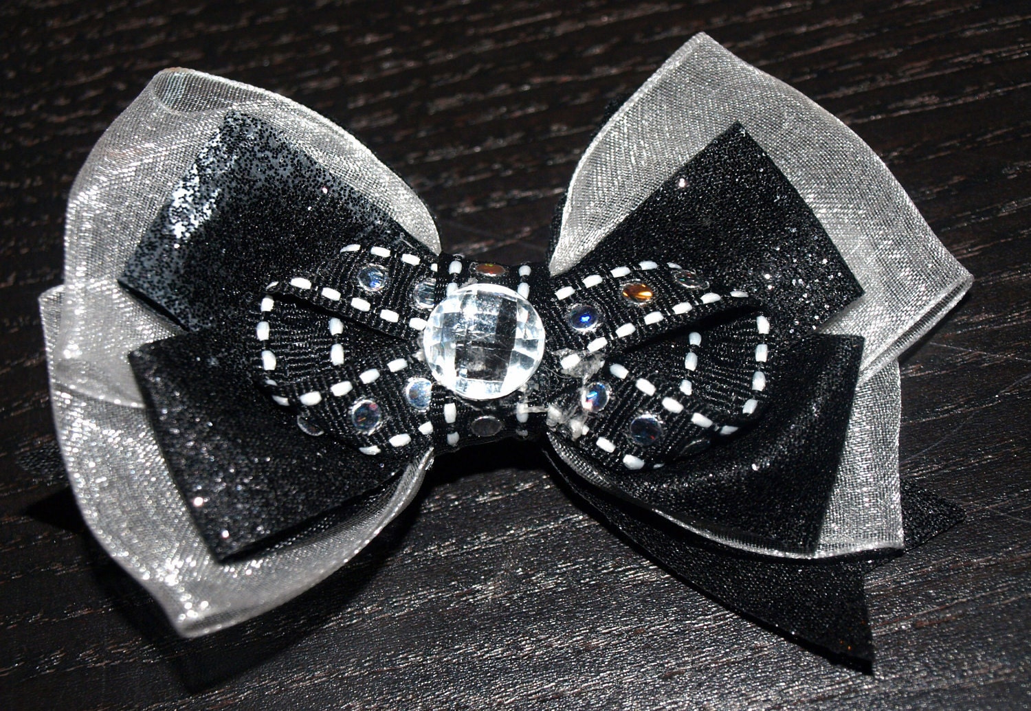 black and silver bow
