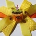 yellow and orange cupcake party bow