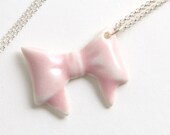 Bow necklace, porcelain bow on a silver chain, in pretty pastel pink.
