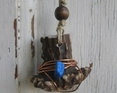copper wire wrapped deer antler bulb amulet with turquoise