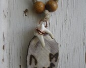 coyote tooth and moose antler burnt rune pendant amulet