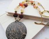 Sale. Fall fashion. Autumn spices. Statement necklace. Wood pendant. Gold beads & gemstones. Free shipping