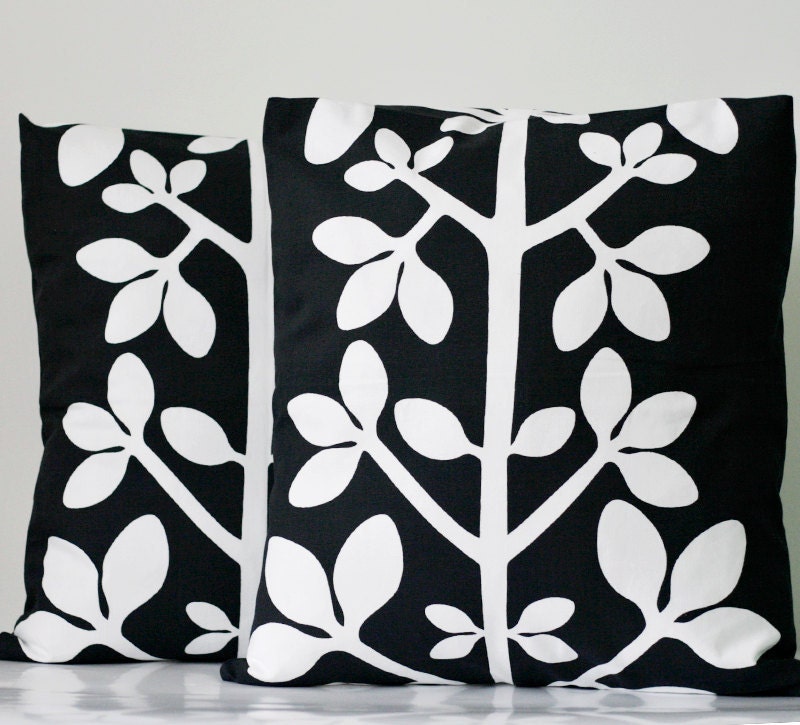 Decorative pillows covers set of two 18x18 inch  from natural cotton fabric. White floral print on black.
