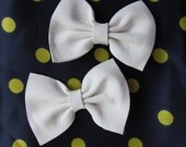 III Pair of Little Tiny White Leather Hair Bows III
