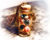 Eyeballs in a bottle necklace, creepy, weird, horror, psychobilly jewelry