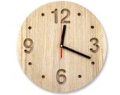 Wall clock made out of solid oak, ash or maple, minimalistic style