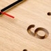 Wall clock made out of solid oak, ash or maple, minimalistic style