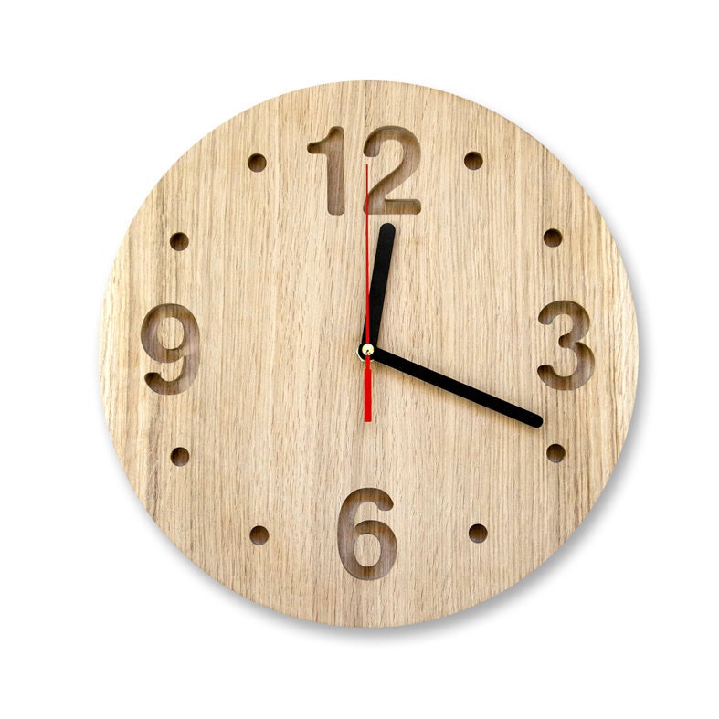 Wall clock made out of solid oak, ash or maple, minimalistic style