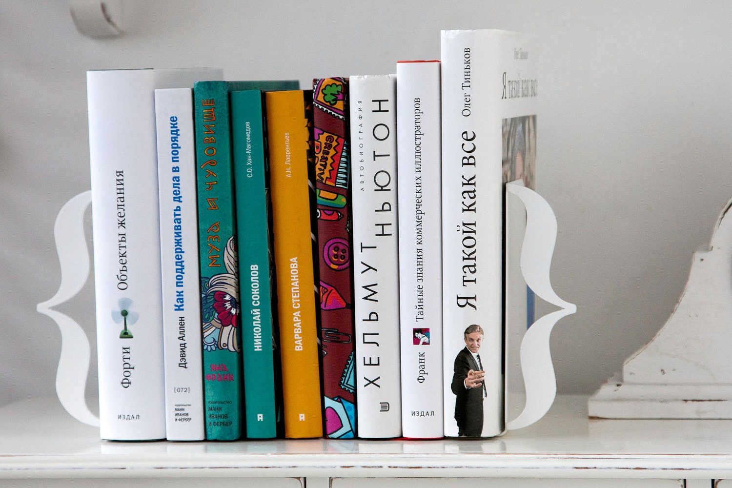 Bookends - Brackets - laser cut for precision out of metal thick enough to hold a bunch of books.
