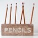 Desk organizer for pencils, brushes and pens. Simple and stylish shabby looking wooden  item