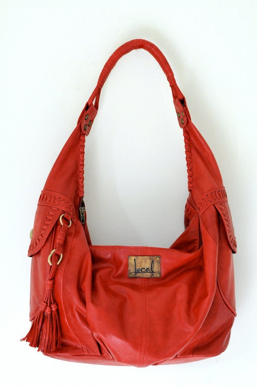 SANCTUM. Leather bag with tassel. Available in different leather colors.