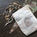 Wedding favor, bird seed toss favors. 50 muslin bags, 2x4, flilled with bird seed. Bird cage design and lovebird tag.