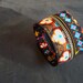wrist wallet black with colored ornaments