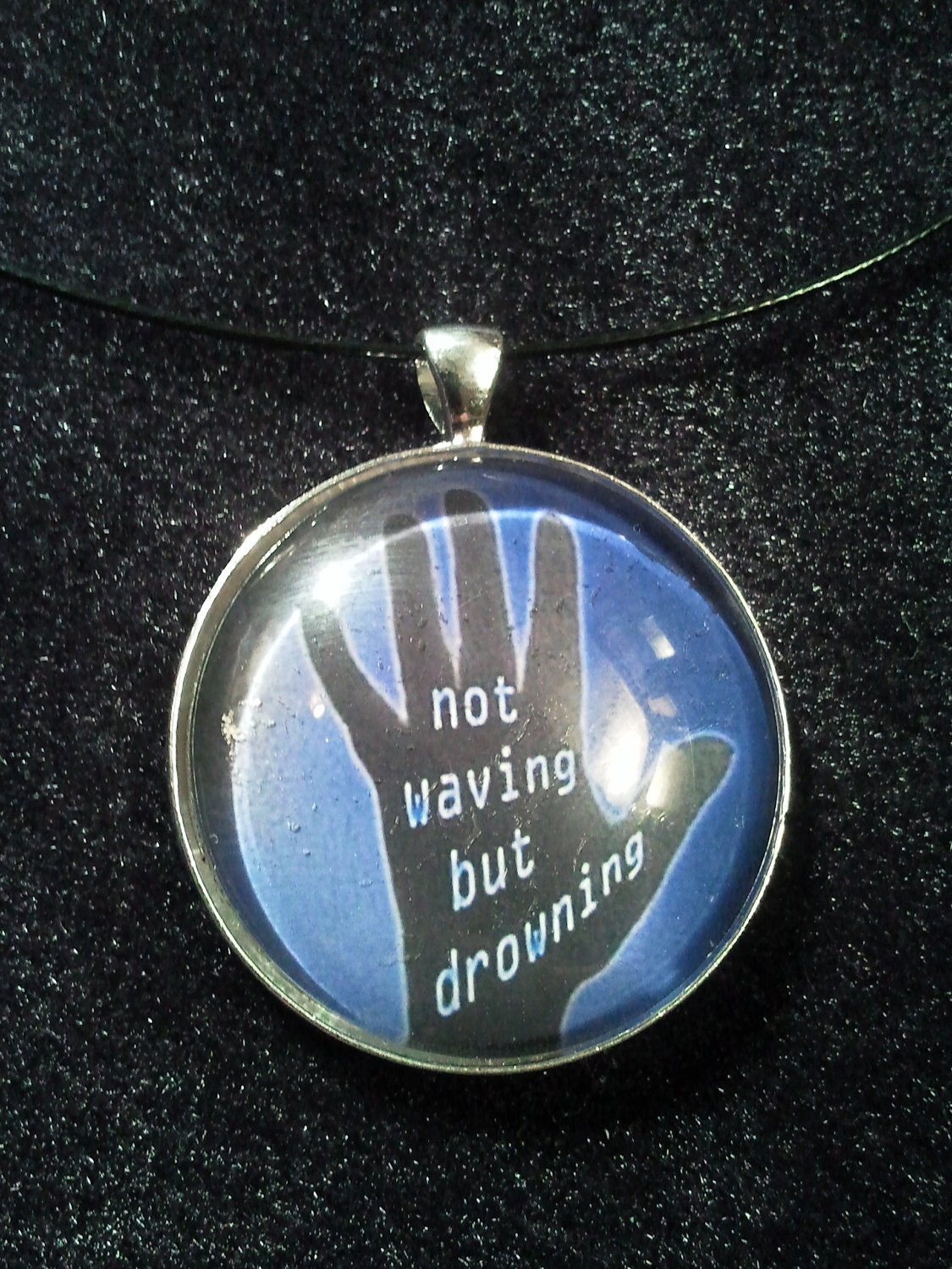 Bookish necklace: Not Waving but Drowning